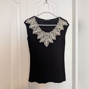 Elegant Black Top with Cream Lace Accent - Size Small